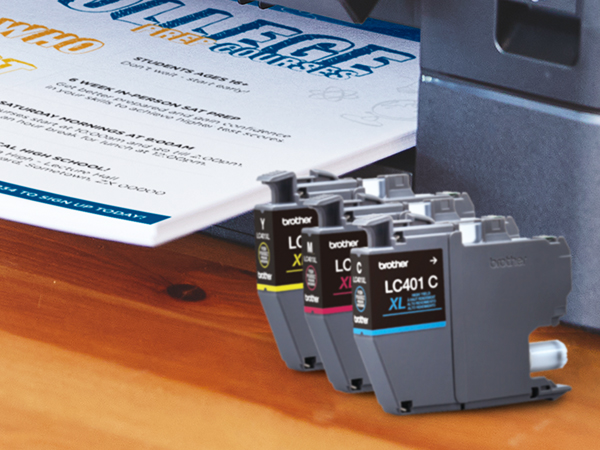 LC401 ink cartridges in front of Brother printer