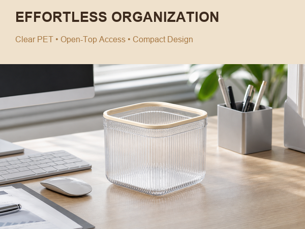 Clear 2.8L open-top small desktop trash can on a modern office desk