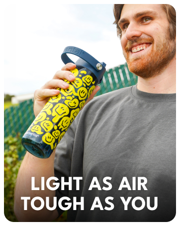 Man holding an Elemental 26oz Splash insulated water bottle designed for lightweight hydration