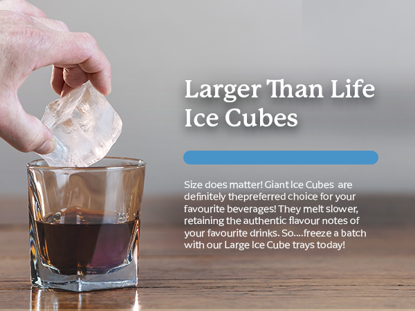 large silicone ice cube being placed in a glass with scotch