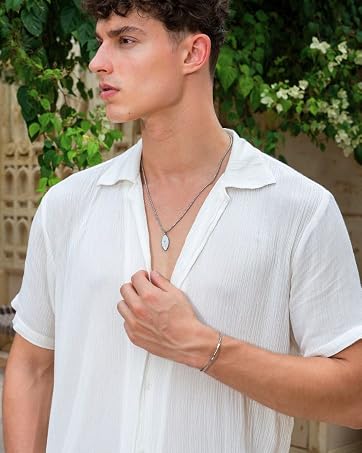 man wearing necklace