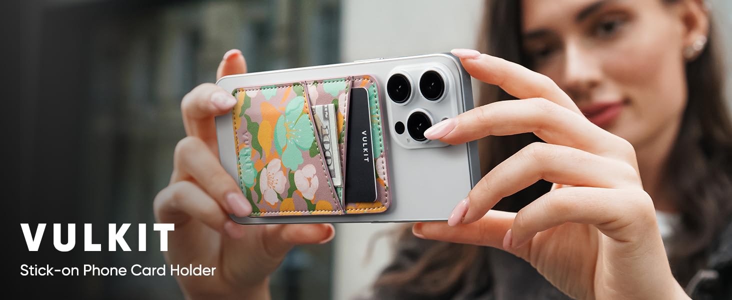 a woman holding a phone with a wallet in her hand.