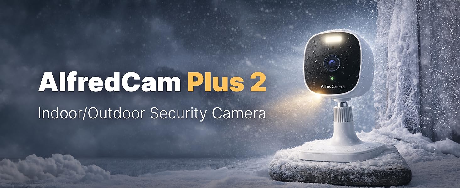 Text reads 'AlfredCam Plus 2' and 'Indoor/Outdoor Security Camera'. Spherical black and white security camera device shown against snowy building exterior.