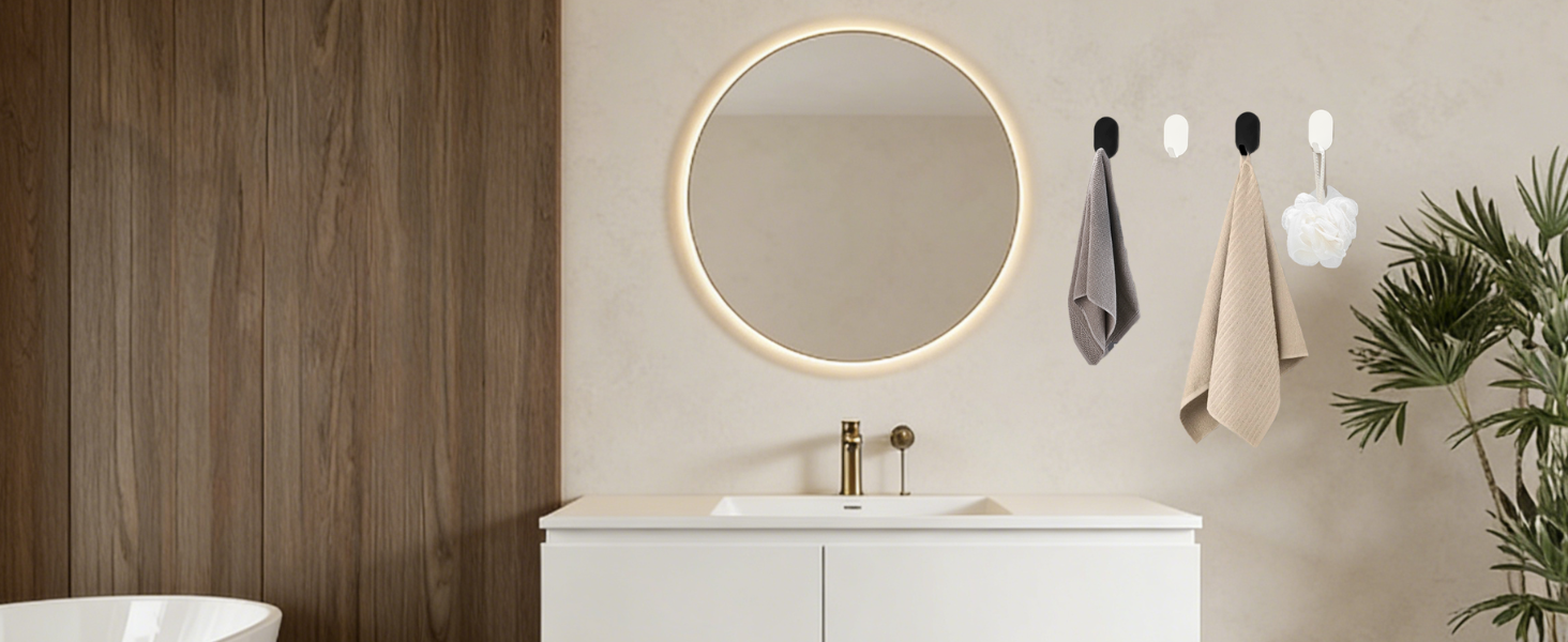Modern bathroom interior featuring wood-panel walls, circular mirror, pendant lighting, and minimalist fixtures in neutral tones.