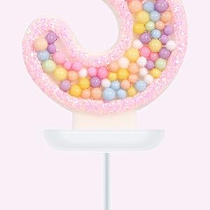 design of pink macaron candles