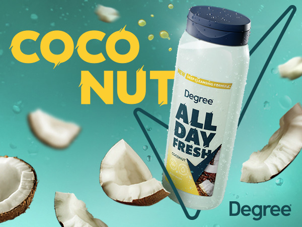 A white Degree Body Wash bottle surrounded by coconut pieces with the text Coconut in yellow
