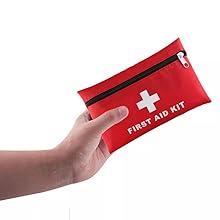hand holding first aid kit