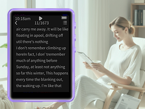 Purple-framed electronic device displaying black text on a white background. A person holds the device, standing in a light-colored interior space with bookshelves visible.