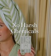 Girl holding bathtub DrainWig packaging