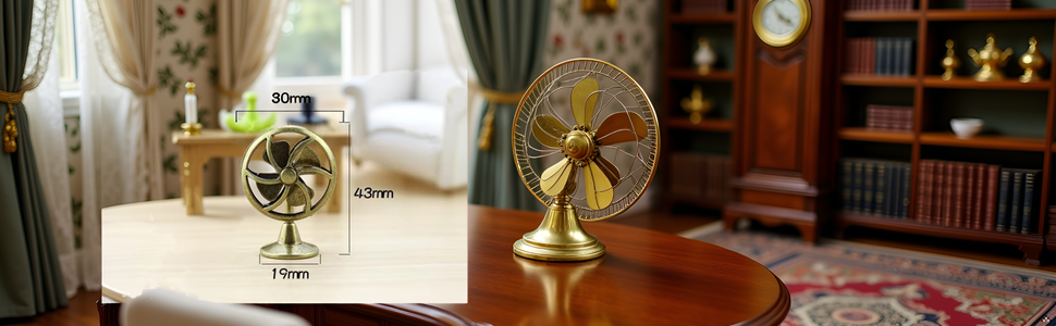 A vintage-style desk with a brass table fan and other antique office accessories.