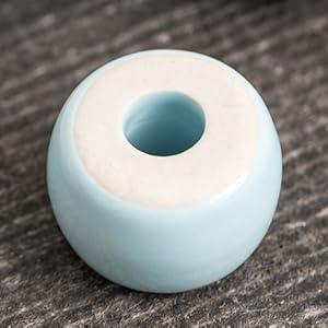 green toothbrush holder
