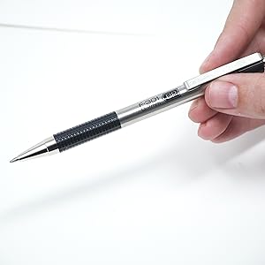 zebra pen f-301 retractable ballpoint pen closeup, desk background
