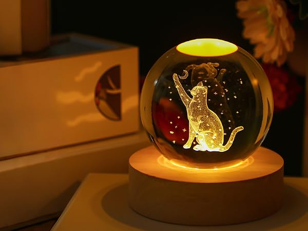 2.3IN CRYSTAL BALL FIGURINES