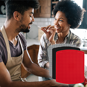 couple enjoying dinner together cooking with reusable air fryer mats