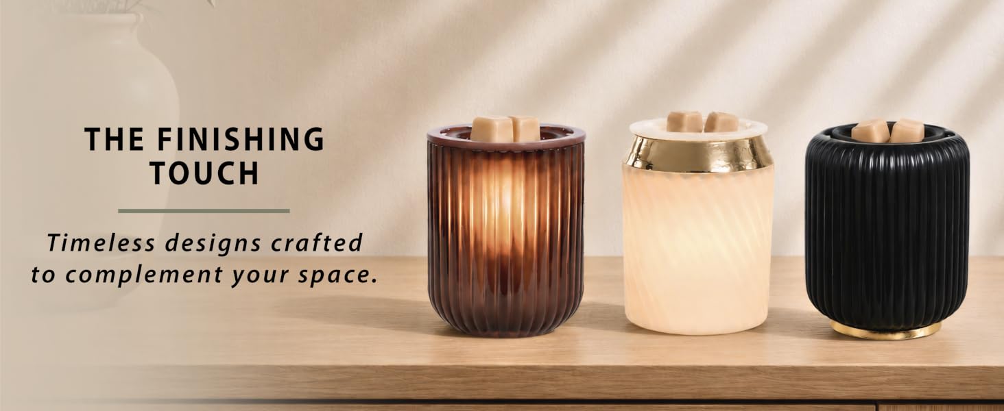 Text: The finishing touch, timeless designs crafted to complement your space. Wax warmers on table.