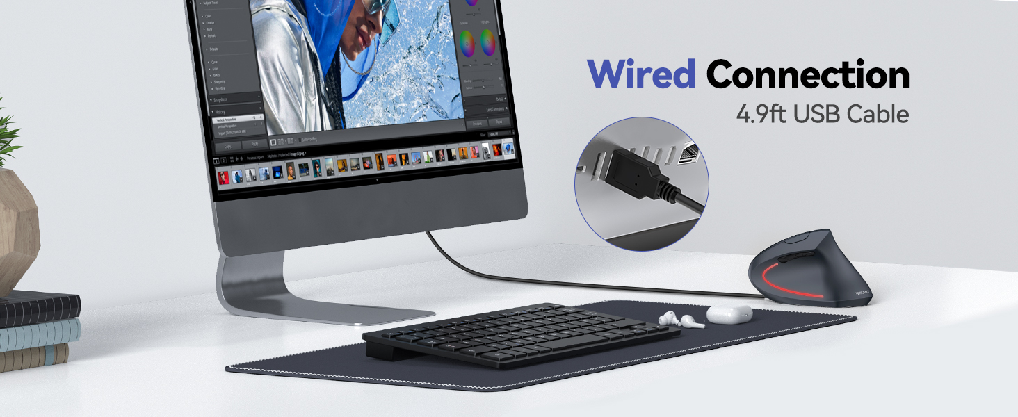 Computer setup showing wired connectivity with 4.9ft USB cable, featuring a monitor, wireless keyboard, and mouse on a desk.