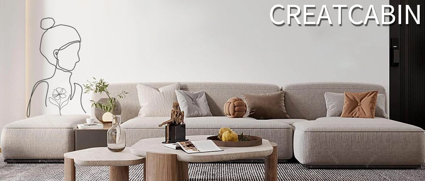 a living room with a sofa, coffee table, and a rug.