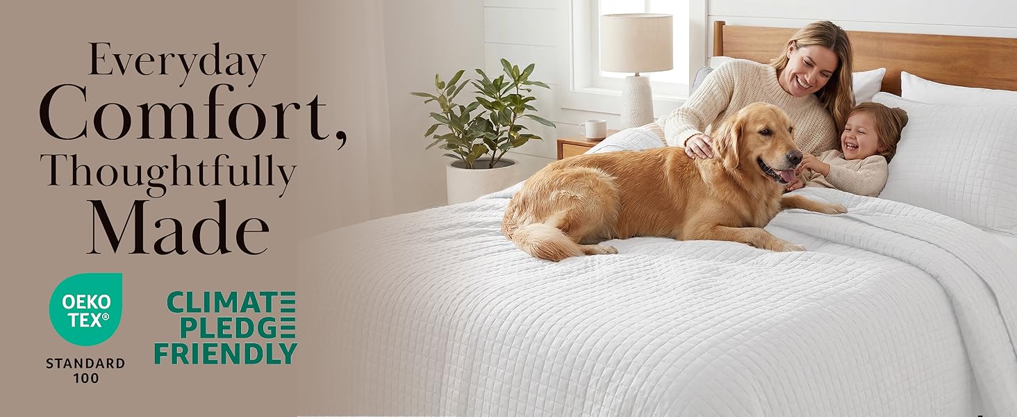 Oversized twin quilt in white with soft quilted texture and layered bed look