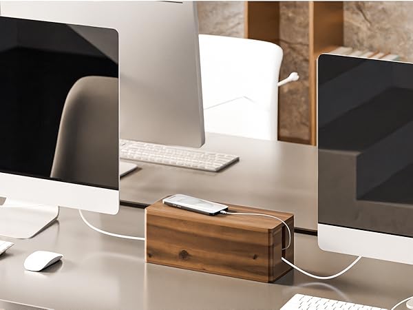 cable box on table between PCs