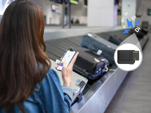 Person using smartphone near luggage conveyor belt. Inset image shows a small electronic device, possibly for luggage tracking.