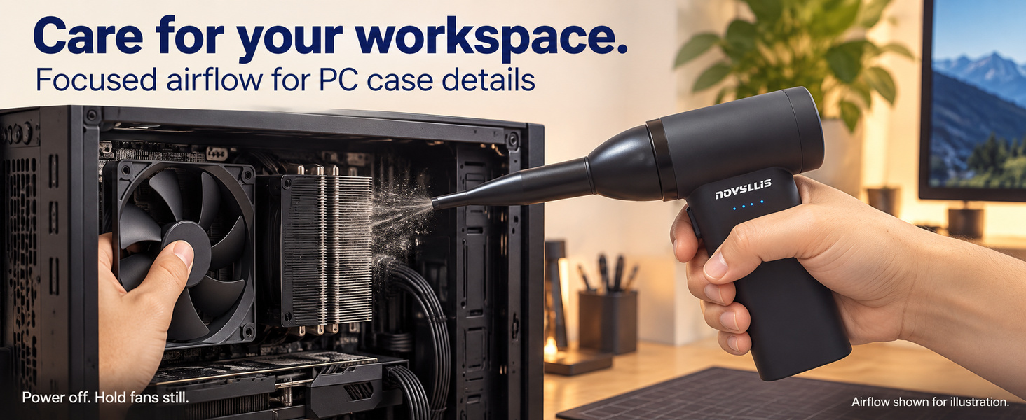 Cordless electric air duster blowing dust from a PC heatsink while the fan is held still