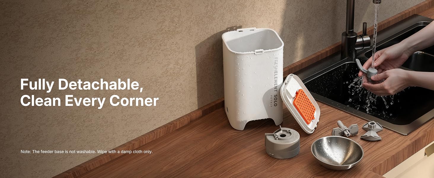 Text reads "Fully Detachable, Clean Every Corner". White cylindrical container with detachable top component being held by hand, revealing internal tank and brush cleaning tool below.