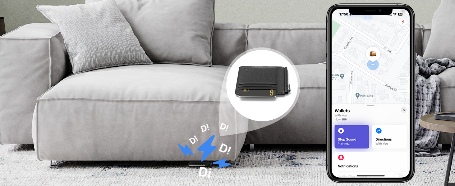 Small black device on living room floor near sofa. Smartphone displays map interface with location markers and menu options.