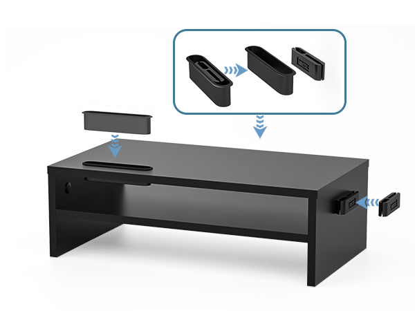 Black monitor stand with adjustable height. Features detachable cable management clips and side-mounted USB hub. Demonstrated with expandable design in top right corner.