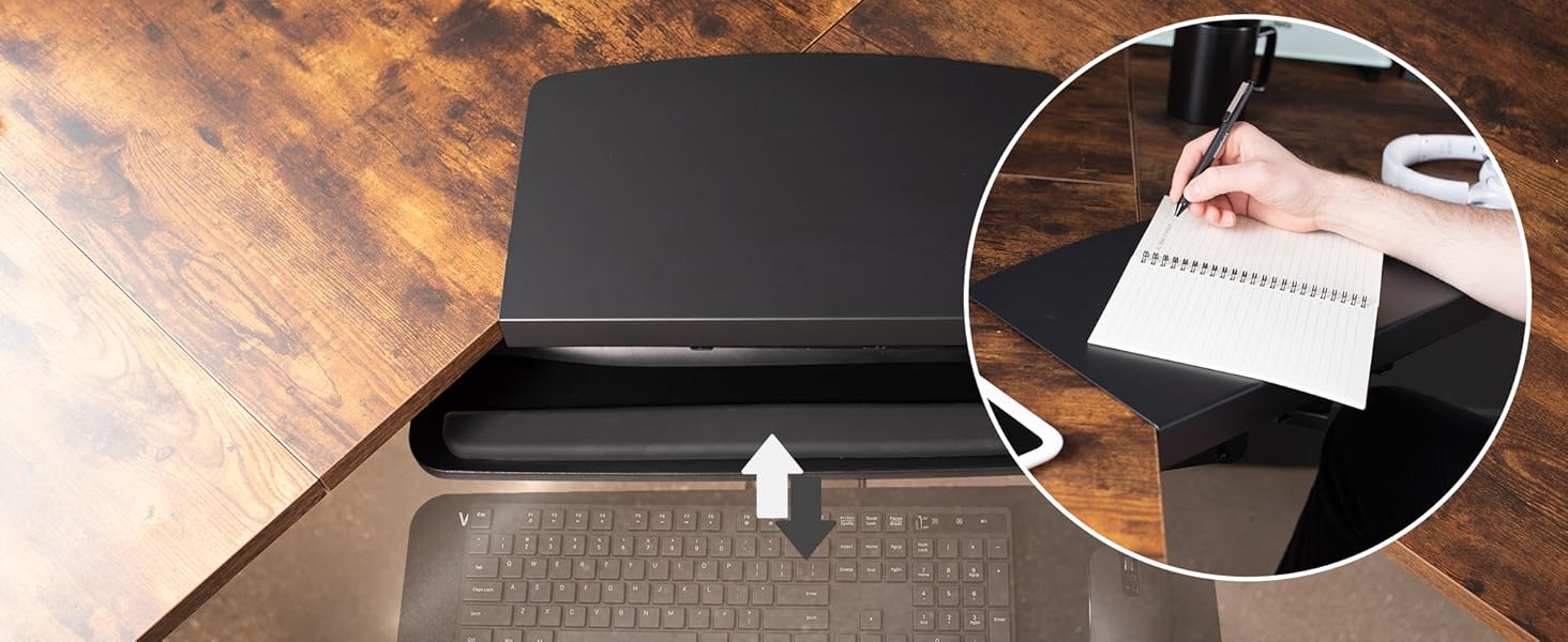 Keyboard tray sliding underneath desk