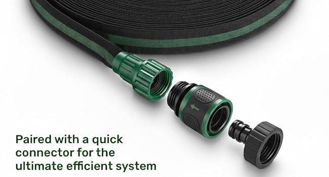 Soaker hose irrigation system in raised garden bed watering vegetable plants evenly