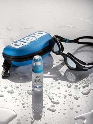 arena anti fog spray for swimming goggles and a goggles case with water droplets in the background
