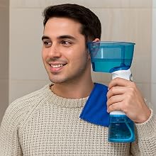 Series of images showing someone using a blue plastic nasal irrigation or healthcare device in a bathroom setting.