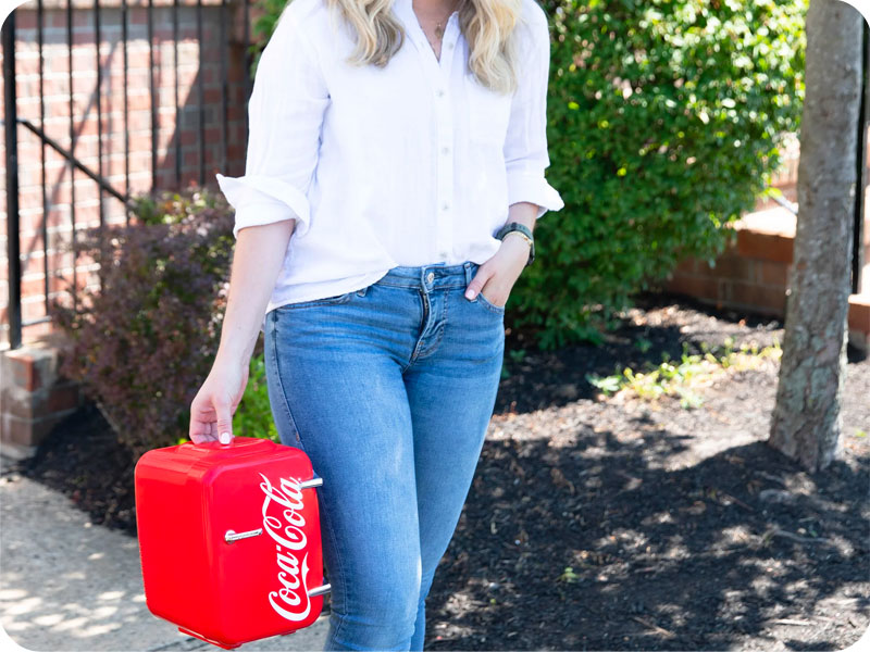 woman carryin red mini fridge portable refrigerator drink mini fridge minifridge minu micro fridge