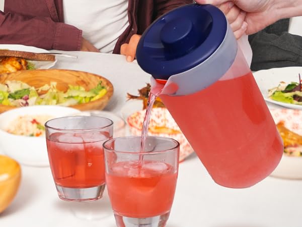 Dishwasher-safe plastic pitcher, BPA-free, with wide mouth and easy-pour lid for beverages.