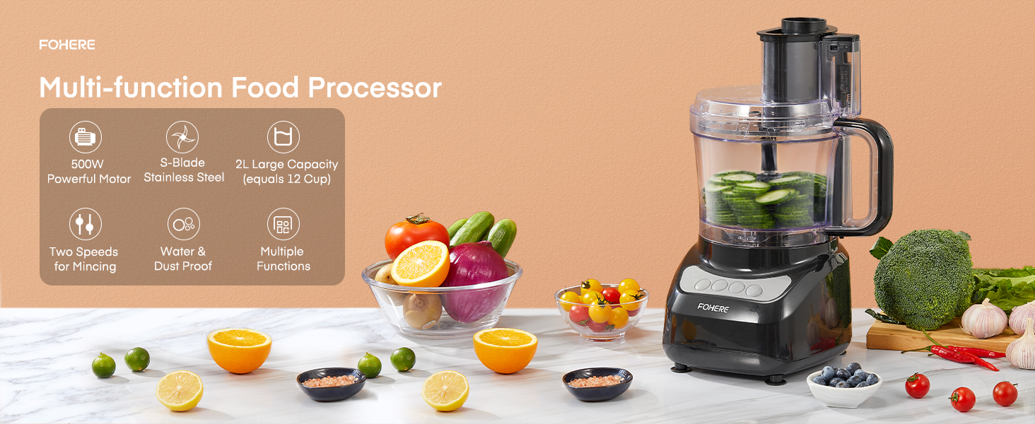 a blender with a bowl of fruit and vegetables on a table.