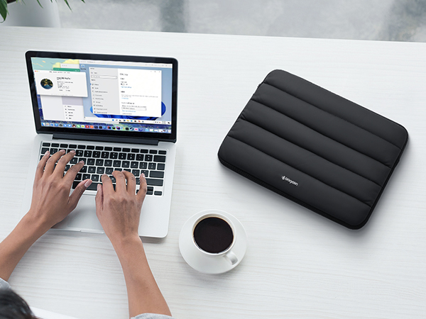 Black puffy laptop sleeve
