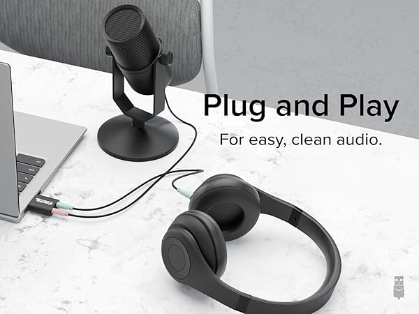 Plugable USB Audio Adapter with 3.5mm jack for easy plug-and-play, delivering clean audio.