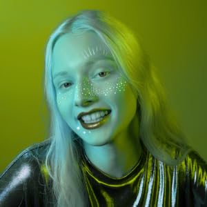 Gold glitter freckle makeup