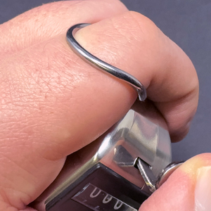 With a large convenient finger ring
