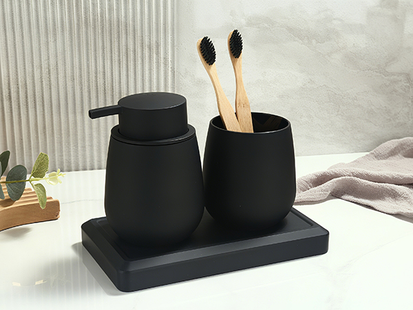 Black foam or cushioned pad shown from multiple angles, appears to be a supportive cushion or padding accessory.