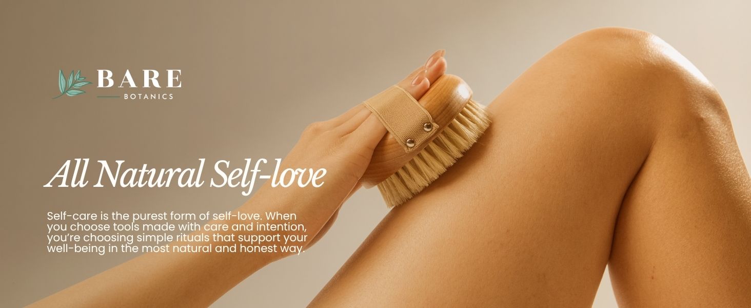 woman dry brushing their leg with a dry brushing body brush