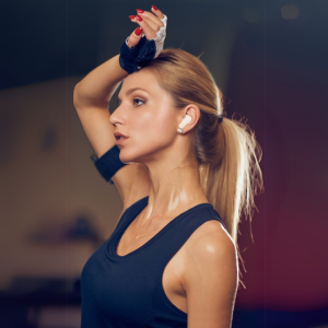 gym girl with earpud to show the water proof IPX4