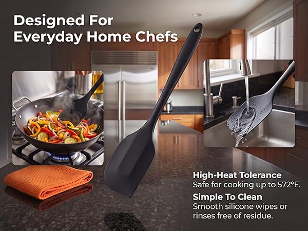 Black silicone spatula ,stir-frying in wok and rinsing under faucet, high-heat tolerance