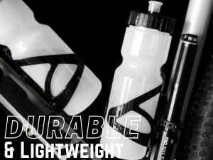 black lightweight bottle cage mounted on a bike downtube
