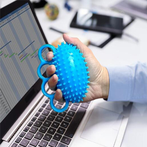 a person holding a ball in their hand