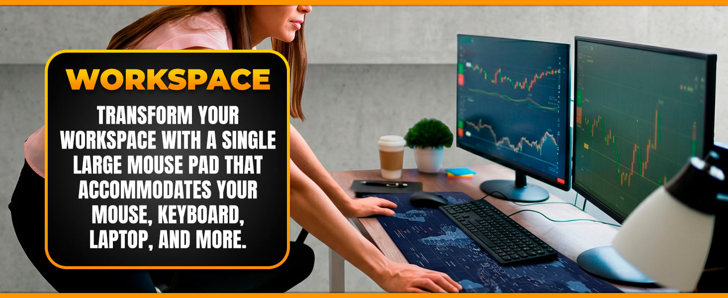 Large mouse pad covering office desk with keyboard, mouse, and dual monitors