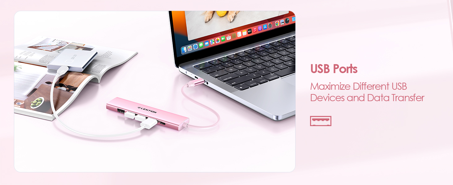 USB hub adapter with multiple ports connected to a laptop. White and pink design with text indicating USB functionality for devices and data transfer.