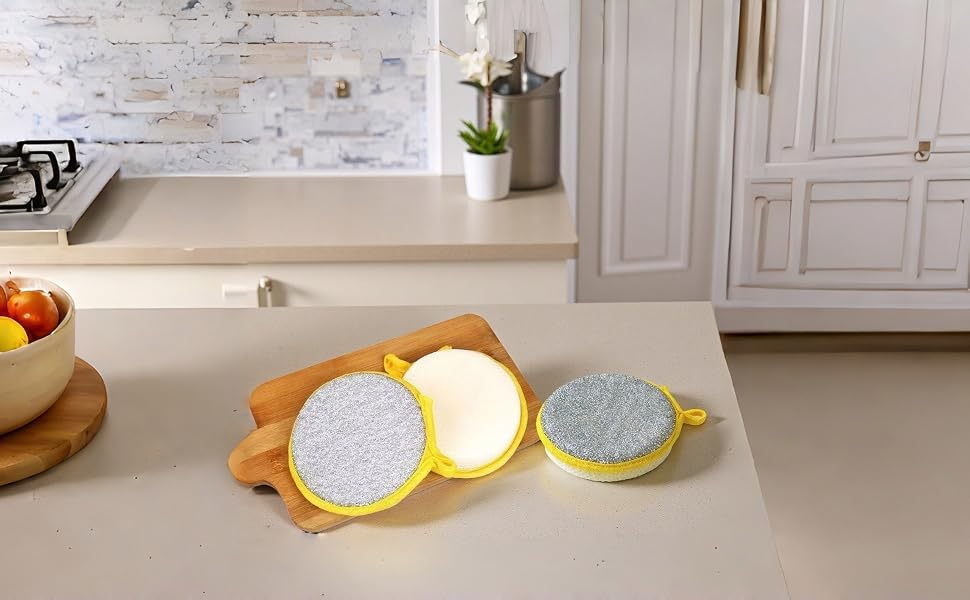 Double-sided sponge: scrub tough messes, wipe surfaces gently.