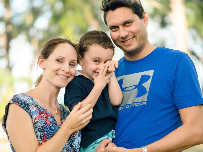 Nereiva founder family smiling outdoors, eco-conscious family brand portrait