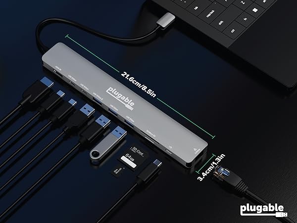 Plugable hub with cables, SD card, and Ethernet port, text "21.6cm/8.5in"